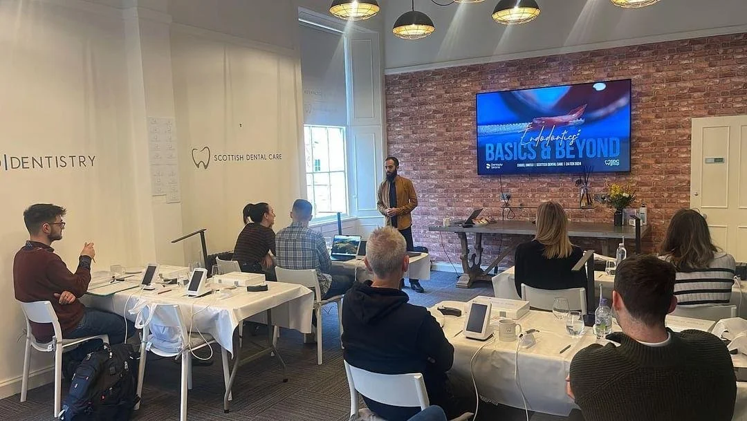 Dr Umerji teaching an endodontics course