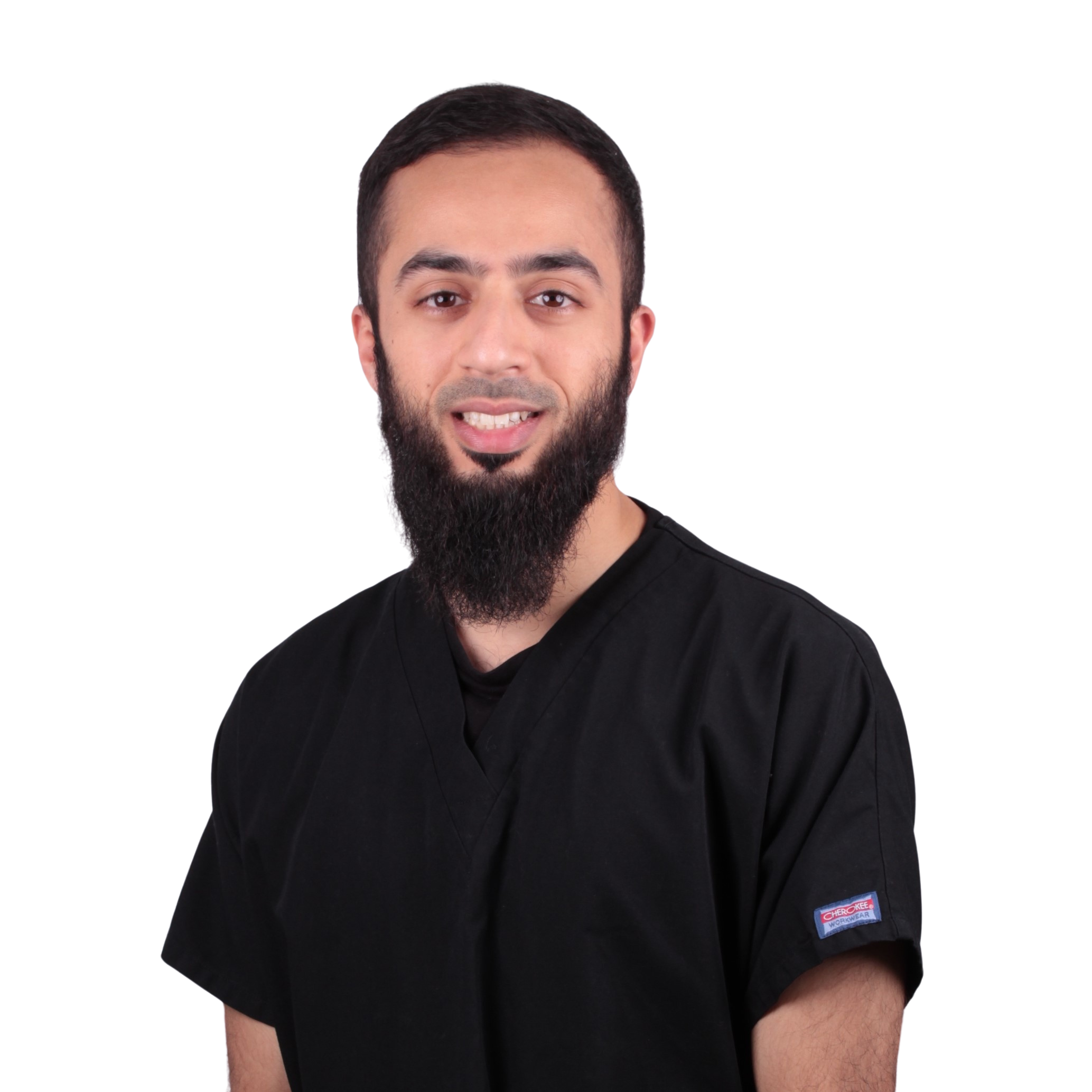 Dr Shakil Umerji in clinical scrubs